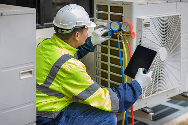 Professional Hvac technician working in Collins, MS